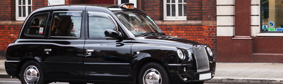 Image of a taxi on the roadside - Taxi Testing Kirkby